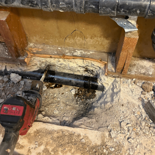 Damaged cast iron drain exposed during Salt Lake City drain work