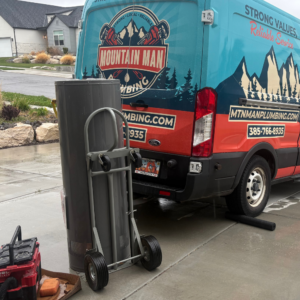 Mountain Man Plumbing removing an old water heater