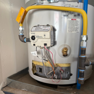 Front of a residential gas water heater during a Utah service call — what a typical repair price covers